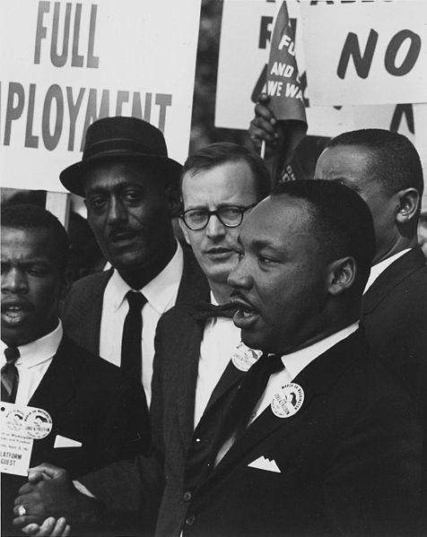 476px-Dr._Martin_Luther_King_Jr._at_a_civil_rights_march_on_Washington_D.C._in_1963.jpg
