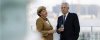 monti-merkel-hp.jpg_1535498604.jpg