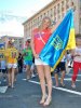 depositphotos_12276045-Young-girl-with-the-Ukrainian-flag-in-her-hands-during-EURO-2012.jpg