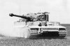 a_tiger_of_101_ss_spzabt_advances_across_open_country_france_spring_1944_small.301nva8qs9mo488c.jpeg