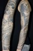 Black-And-Grey-Koi-Sleeve-Tattoo.jpg