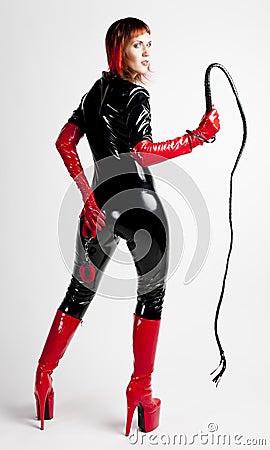 woman-holding-whip-24225894.jpg