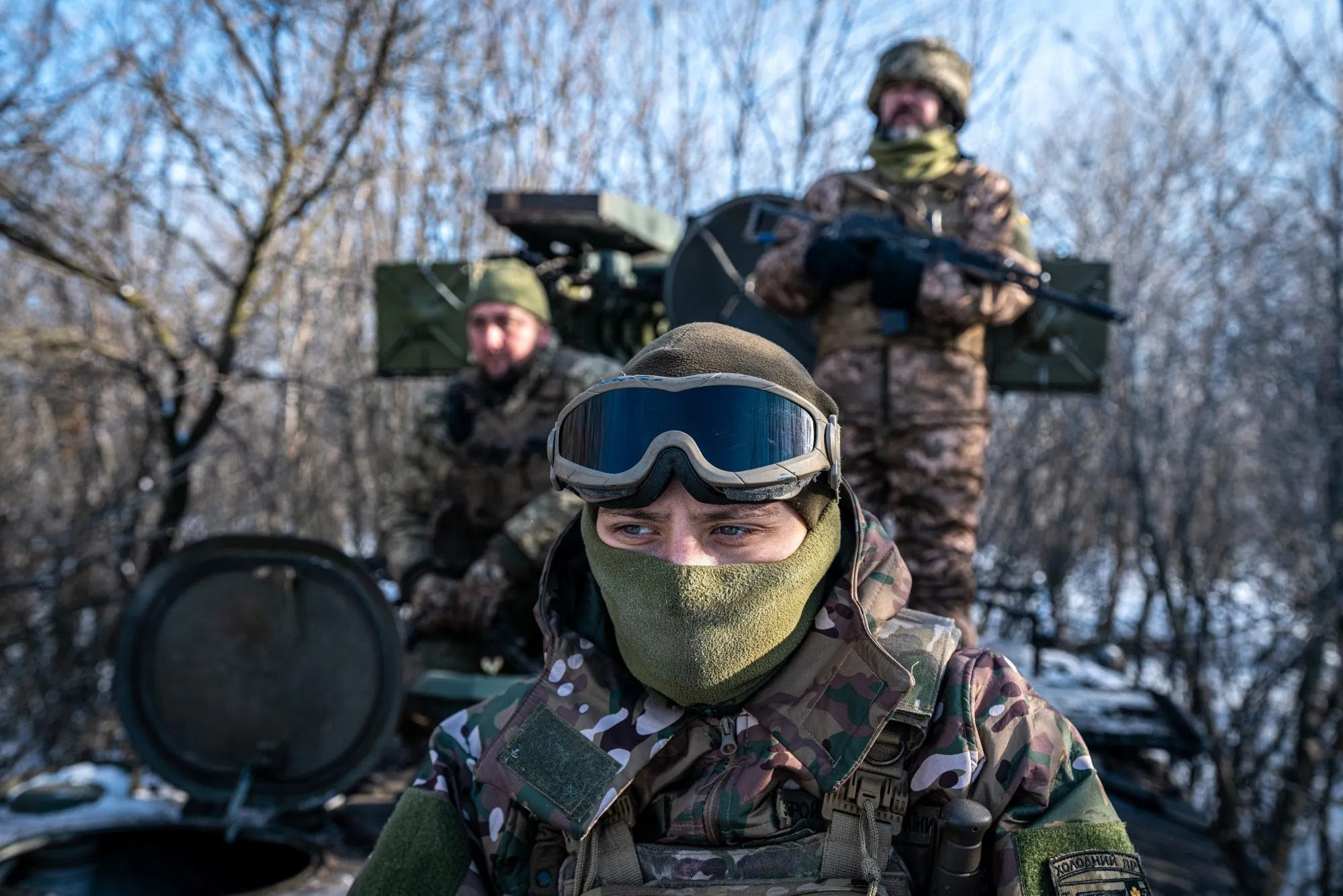 Ukrainian soldiers by an anti-aircraft vehicle towards its position at the Bakhmut frontline, in Donetsk Oblast. Ukrainian soldiers by an anti-aircraft vehicle towards its position at the Bakhmut frontline, in Donetsk Oblast.